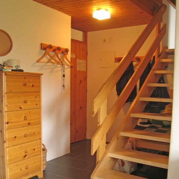 Eingangsbereich & kurze Treppe zur Oberen Etage
